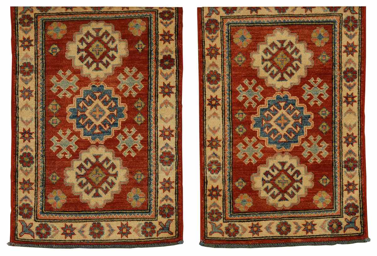 Appraisal: ORIENTAL RUG PAIR OF KAZAK DESIGN MATS ' x '