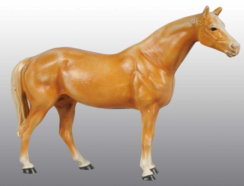 Appraisal: Cast Iron Thoroughbred Doorstop Description Made by Hubley cat Full-figure