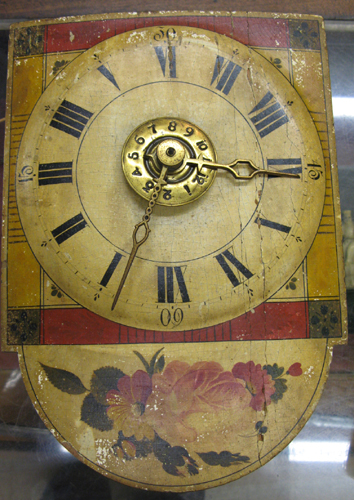 Appraisal: A WAG-ON-THE-WALL STYLE CLOCK painted wood face with roman numerals