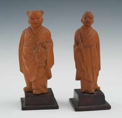 Appraisal: Two Carved Wood Girls on Stands Chinese Each apprx H