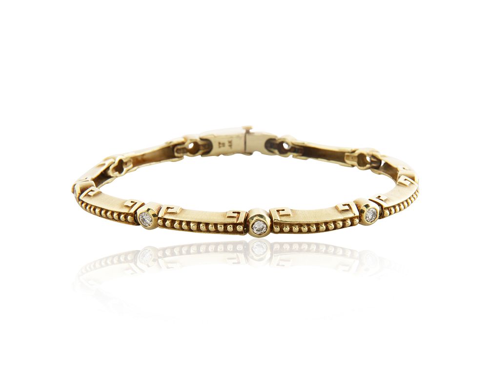 Appraisal: KT YELLOW GOLD AND DIAMOND BRACELET KT YELLOW GOLD AND