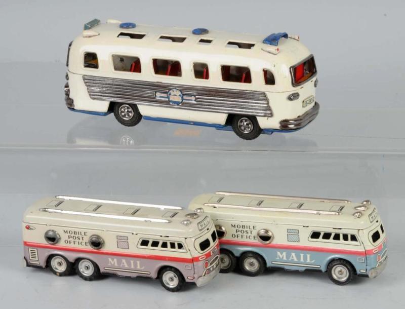 Appraisal: Lot of Tin Bus Friction Toys Description Japanese Working One