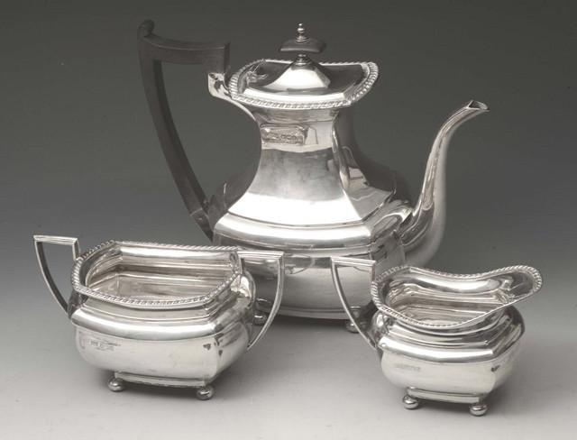 Appraisal: A THREE PIECE SILVER TEA SET of square cut baluster