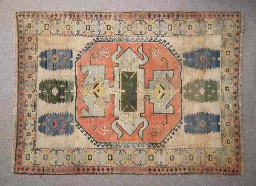 Appraisal: A th Century Caucasian carpet woven in colours with geometric