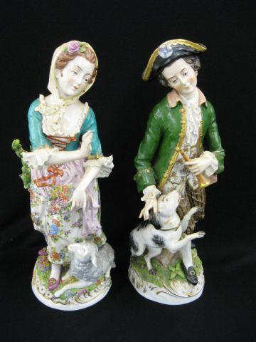 Appraisal: Pair of Sitzendorf Porcelain Figurines peasant young man with dog