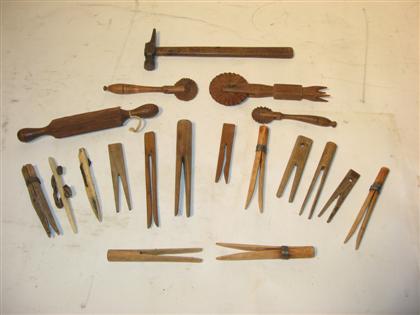 Appraisal: A group of assorted wooden implementsincluding clothes pins bone items