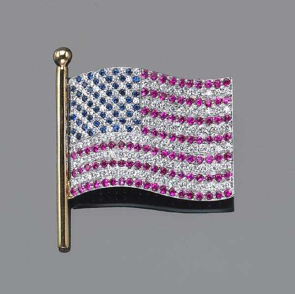 Appraisal: A diamond ruby sapphire and eighteen karat gold American flag