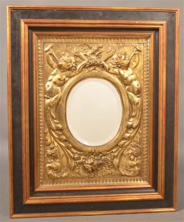 Appraisal: Antique Embossed Brass Framed Mirror With cherub and floral design