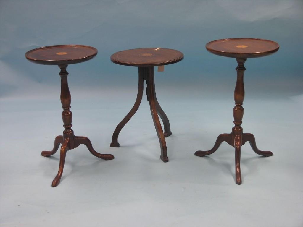 Appraisal: Three various mahogany wine tables each circular with inlaid batswing