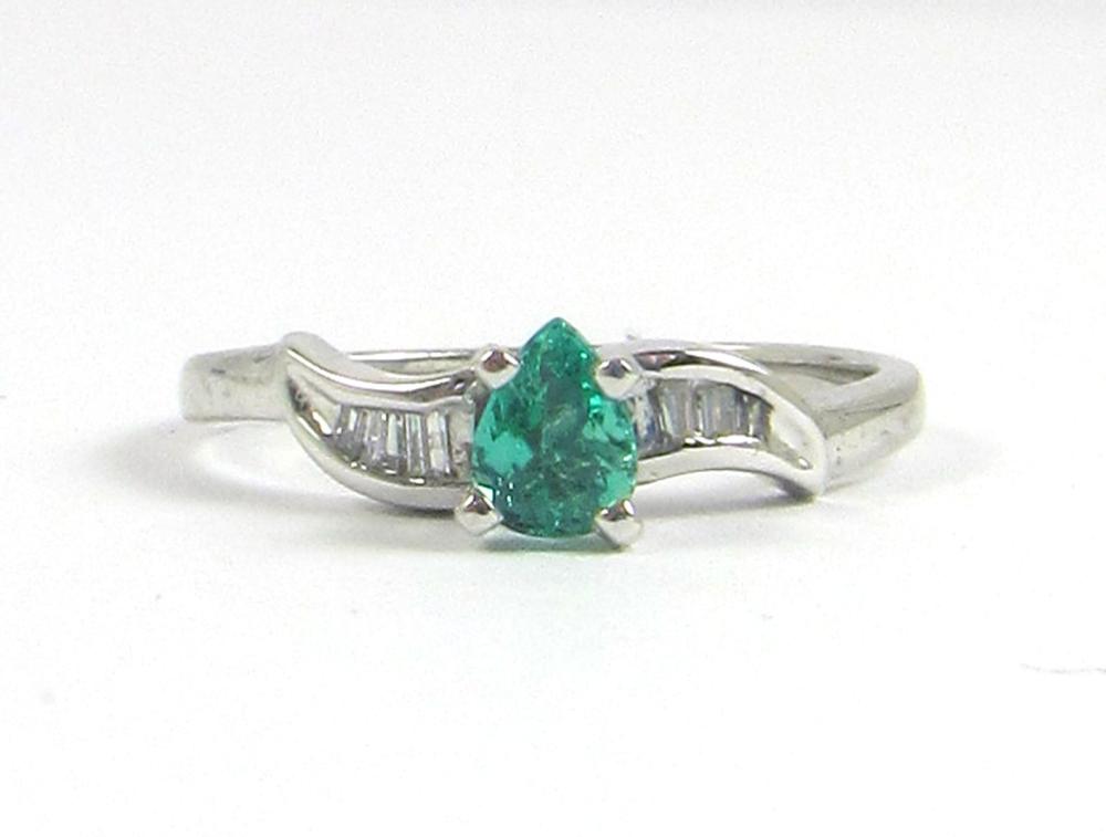 Appraisal: EMERALD DIAMOND AND FOURTEEN KARAT GOLD RING The k white