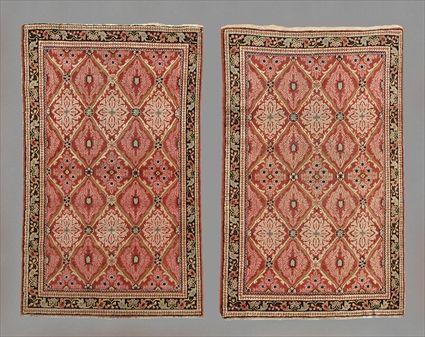 Appraisal: PAIR OF PERSIAN RUGS Worked with pink trellis pattern within