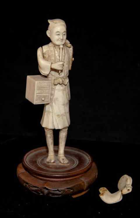 Appraisal: JAPANESE IVORY OKIMONO OF A DRUMMER the man in a