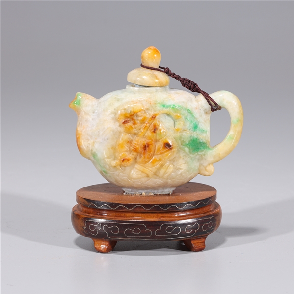 Appraisal: Chinese carved jadeite teapot with some rust and apple green