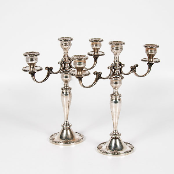 Appraisal: American ca s A pair of Gorham three-arm candelabra decorated