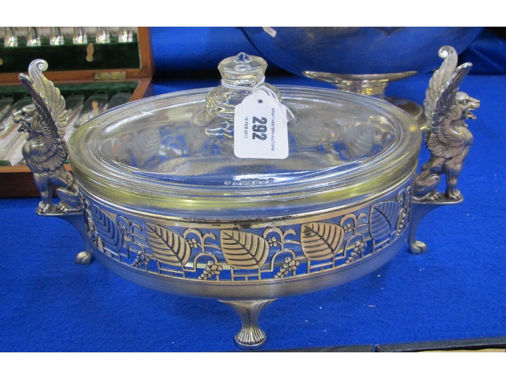 Appraisal: Casserole dish in WMF white metal dish frame with griffin