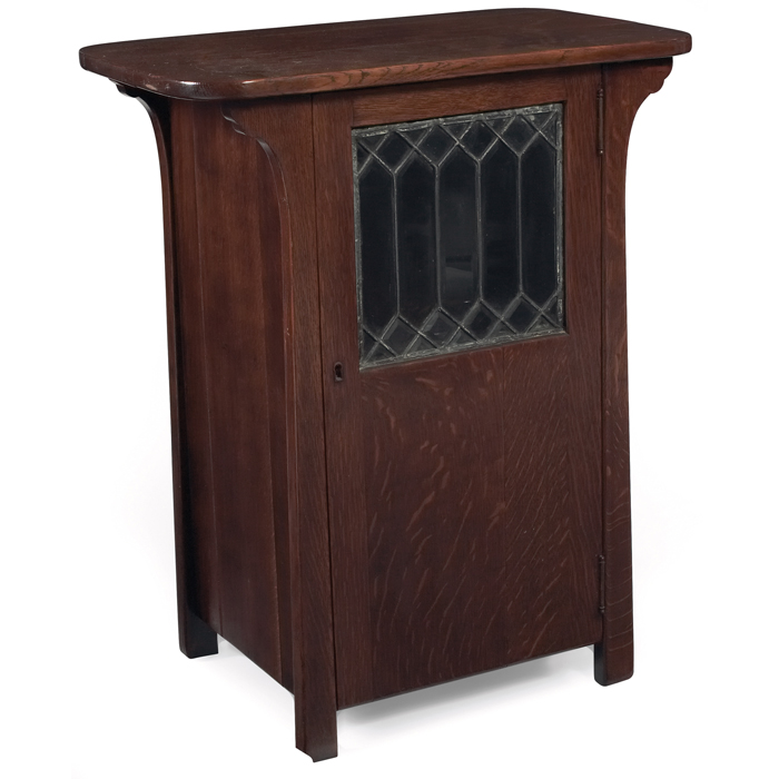 Appraisal: Arts and Crafts smoking stand singledoor with beveled leaded glass