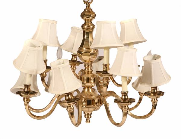 Appraisal: A gilt bronze style twelve light chandelier with two matching