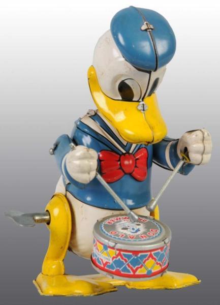 Appraisal: Lot of Walt Disney Donald Duck Drummer Toys Description Includes