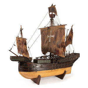 Appraisal: A Painted Wood and Canvas Model of a Three-Masted Ship