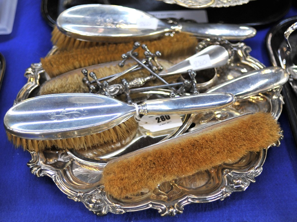 Appraisal: Lot comprising silver dressing table set knife rests napkin ring