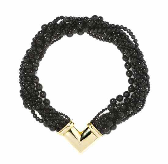 Appraisal: A Multi Strand Karat Yellow Gold and Onyx Necklace consisting