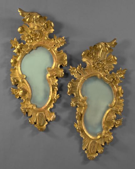 Appraisal: Pair of Exuberantly Modeled Italian Carved Giltwood Looking Glasses second