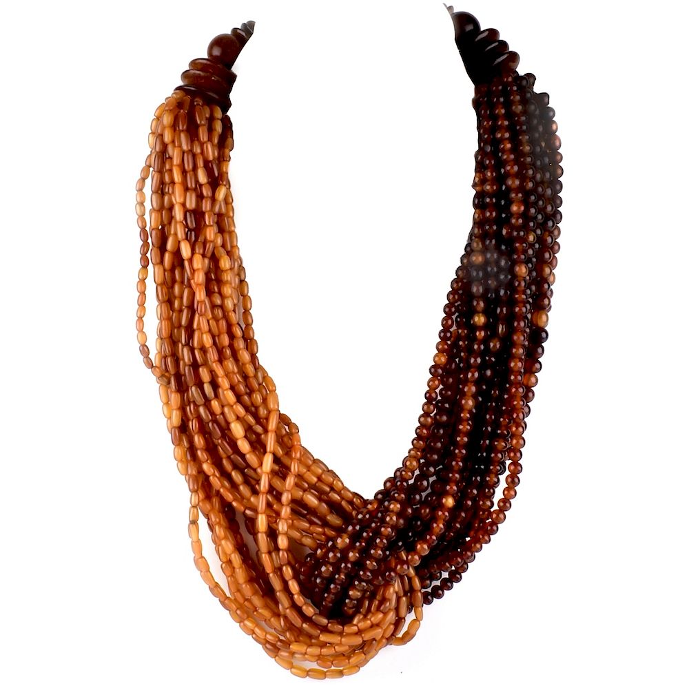 Appraisal: Large Amber and Horn Torsade Necklace Large Multi Strand Amber