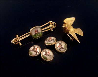 Appraisal: A gold tie pin with a matching pair of cuff