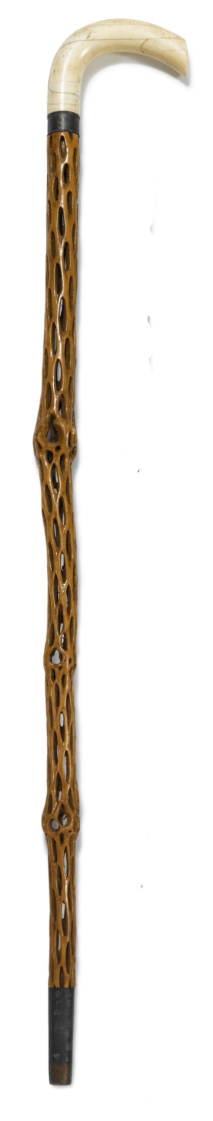 Appraisal: Interesting pierced hardwood and ivory handled walking stickprobably colonial th