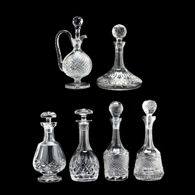 Appraisal: SIX ASSORTED CUT CRYSTAL DECANTERS Including a ship's decanter one