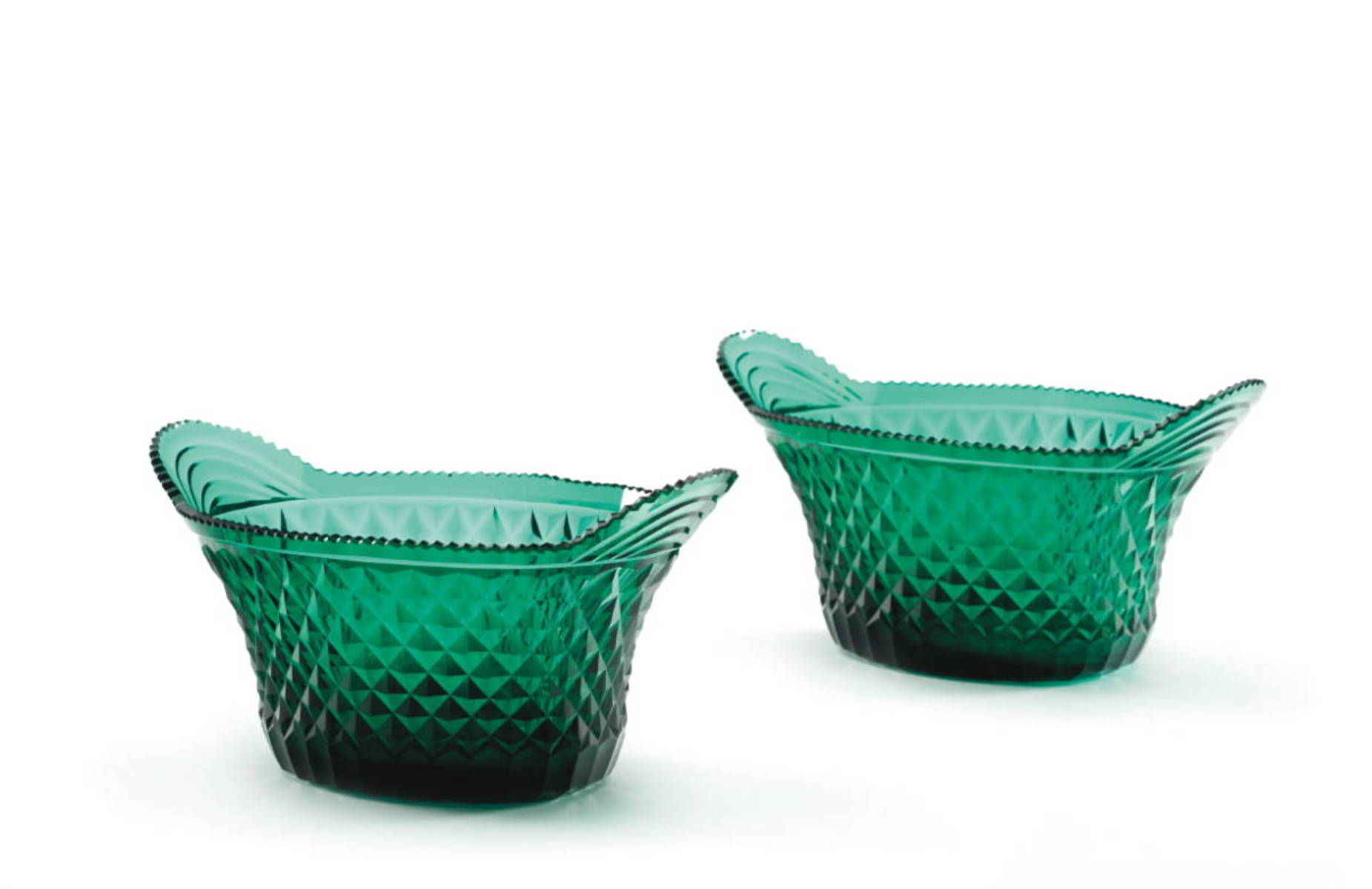 Appraisal: PAIR OF ANGLO-IRISH EMERALD GREEN BOAT-SHAPED BOWLS WITH DIAMOND CUTTING