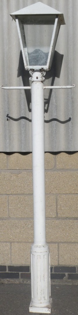 Appraisal: A thC metal framed and glazed street lamp on columns