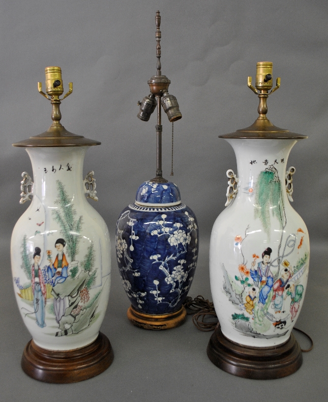 Appraisal: - Pair of Chinese porcelain vase lamps decorated with figural