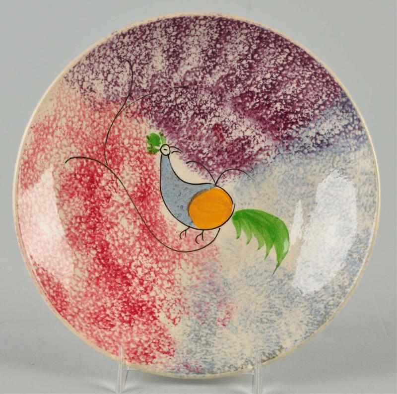 Appraisal: Rare Rainbow Spatterware Saucer Description Circa Purple red and blue