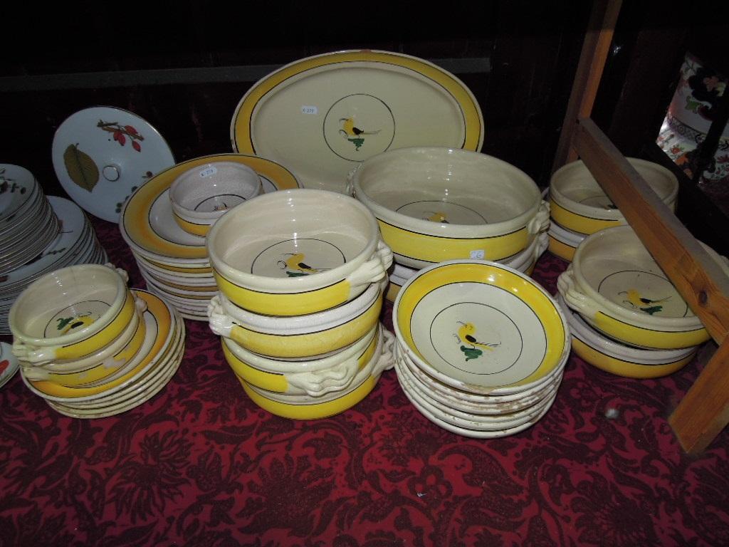 Appraisal: An extensive collection of Italian rustic style pottery dinnerwares with