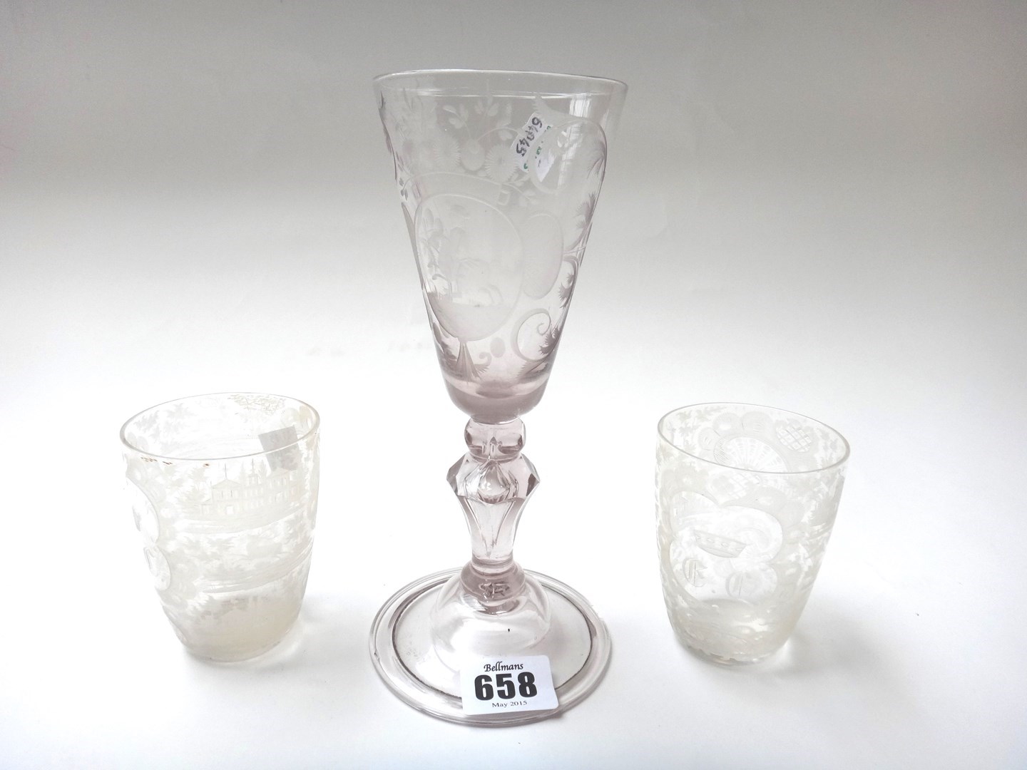 Appraisal: A Bohemian engraved wine glass circa the rounded funnel bowl