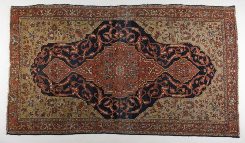 Appraisal: Antique Fereghan Sarouk Rug ca red poled center medallion against