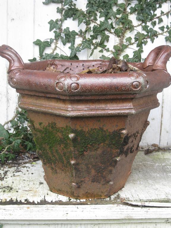 Appraisal: A glazed Coade stone type octagonal two handled Jardiniere of