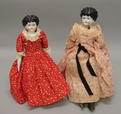 Appraisal: Pair of china Lowbrow dolls with black hair Has original