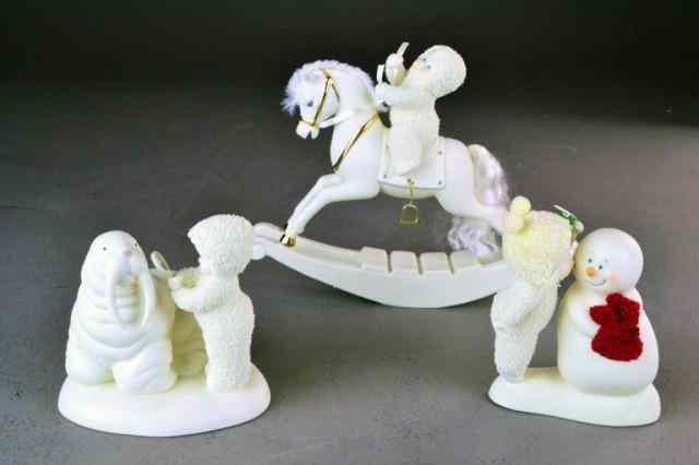 Appraisal: SNOWBABIES - BISQUE PORCELAIN FIGURINESIncluding 'Meet Me Under the Mistletoe'