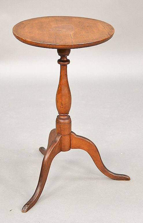 Appraisal: Cherry candlestand with round top on slender turned shaft set