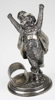 Appraisal: Puss in Boots finely detailed silver plated figural napkin ring