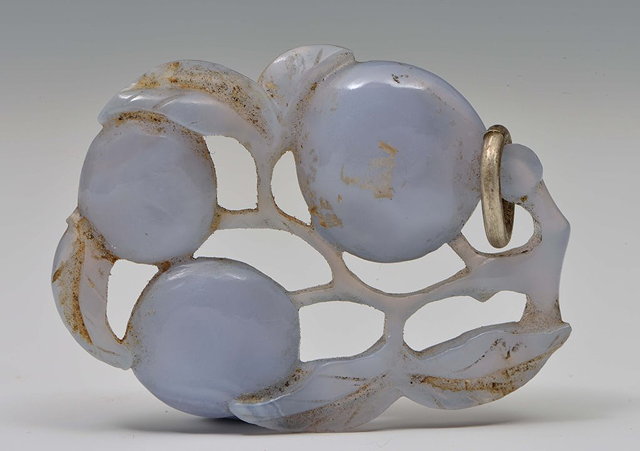 Appraisal: A CHINESE PALE BLUE AGATE PENDANT in the form of