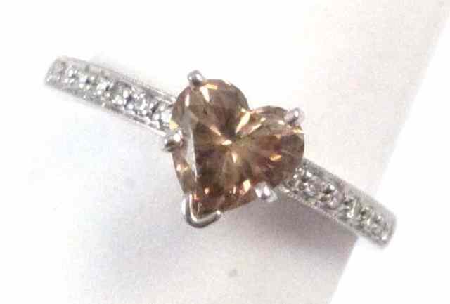 Appraisal: FANCY BROWN DIAMOND AND WHITE GOLD RING k white gold