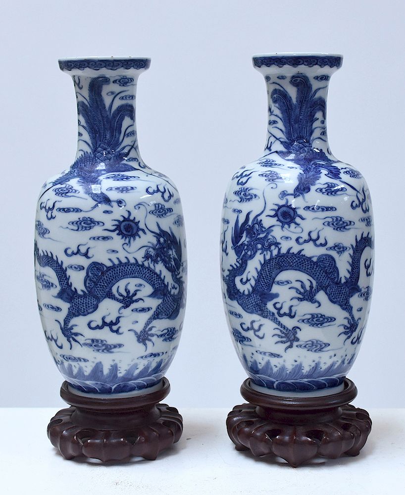 Appraisal: Pair Chinese th C blue and white vases on carved