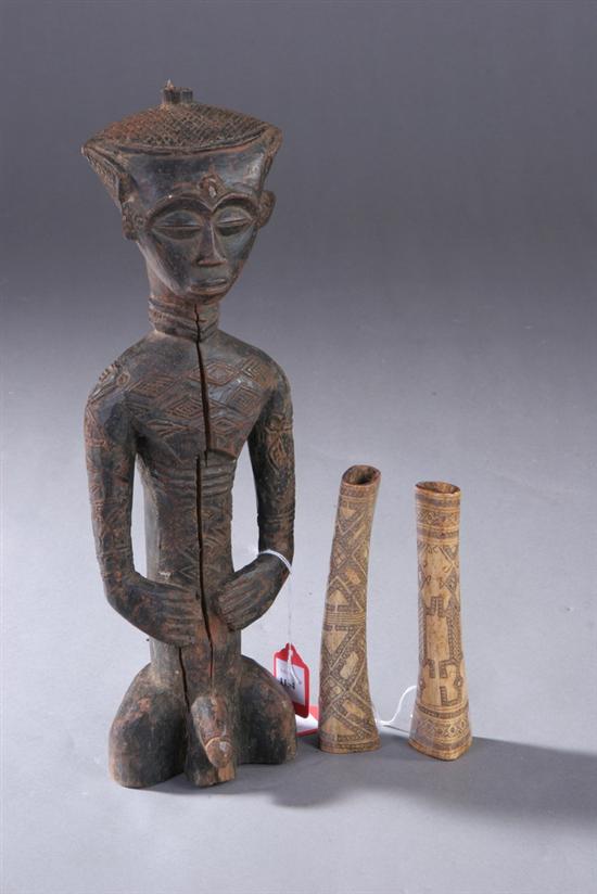 Appraisal: NDENGESE WOOD FIGURE OF ANCESTOR WITH SCARIFICATION Circa Republic of