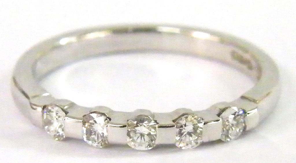 Appraisal: platinum five stone diamond eternity ring - A