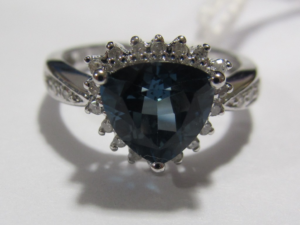 Appraisal: Nine carat gold trillion cut London blue topaz and diamond