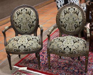 Appraisal: Pair of Louis XV style walnut fauteuils Pair of Louis