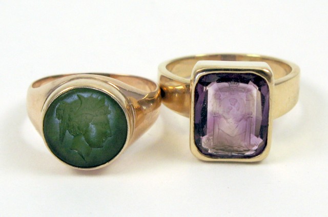 Appraisal: TWO INTAGLIO GLASS AND YELLOW GOLD RINGS one k yellow